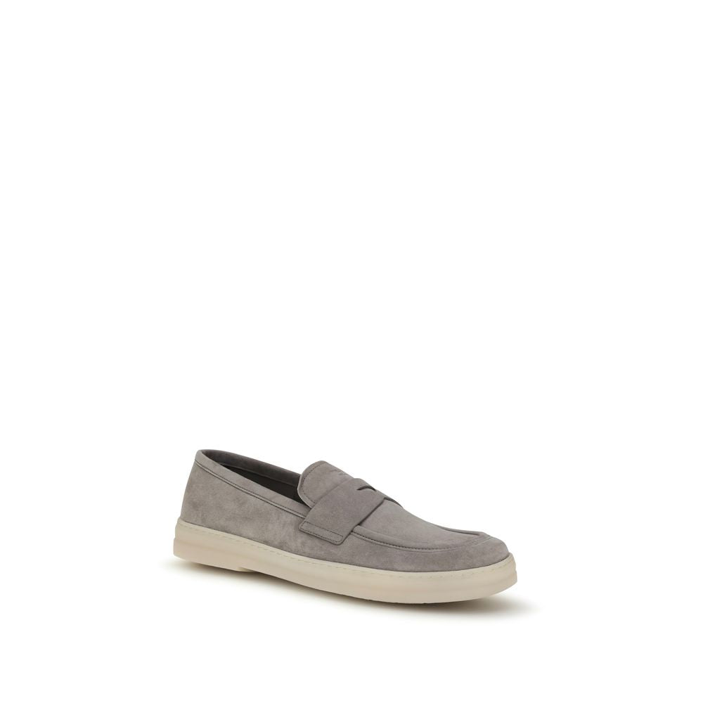Chaussures slip-on Prada Bos Taurus en cuir de veau gris, élégantes mocassins à enfiler pour homme.