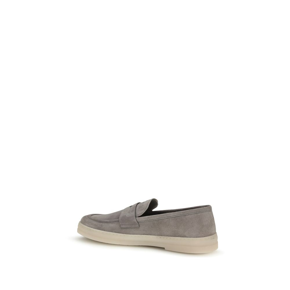 Chaussures Prada Bos Taurus en cuir gris pour homme, mocassins slip-on élégants et confortables.