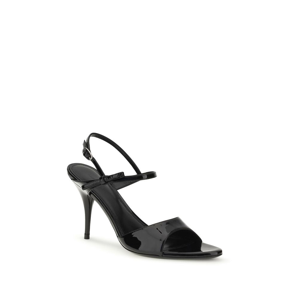 Sandales à talons stilettos Balenciaga en cuir de veau noir, modèle Bos Taurus, visibles sur l'image.