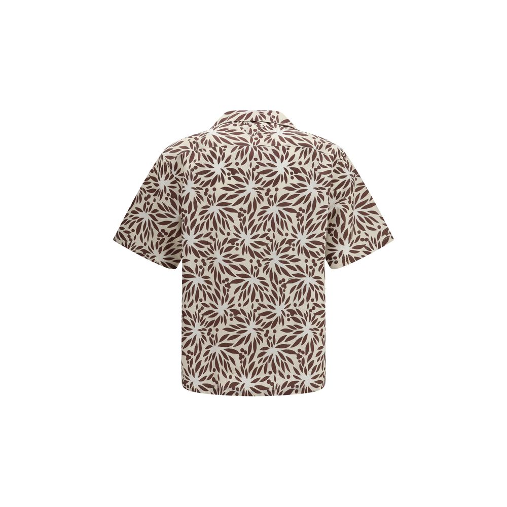 Chemise Prada en coton marron avec motif élégant, boutons visibles, ajustée sur mannequin.
