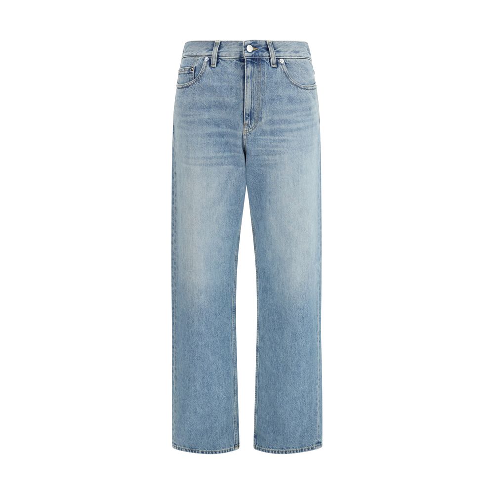 Jeans droits en coton bleu Gucci, pantalon décontracté avec coupe droite, visibles avec détails de couture et étiquette Gucci.