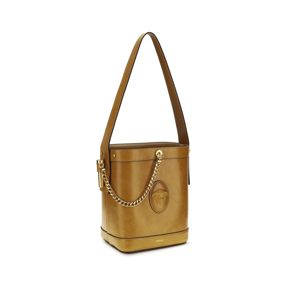 Sac à main Bos Taurus en cuir de veau marron de Versace, avec détails élégants et logo visible.