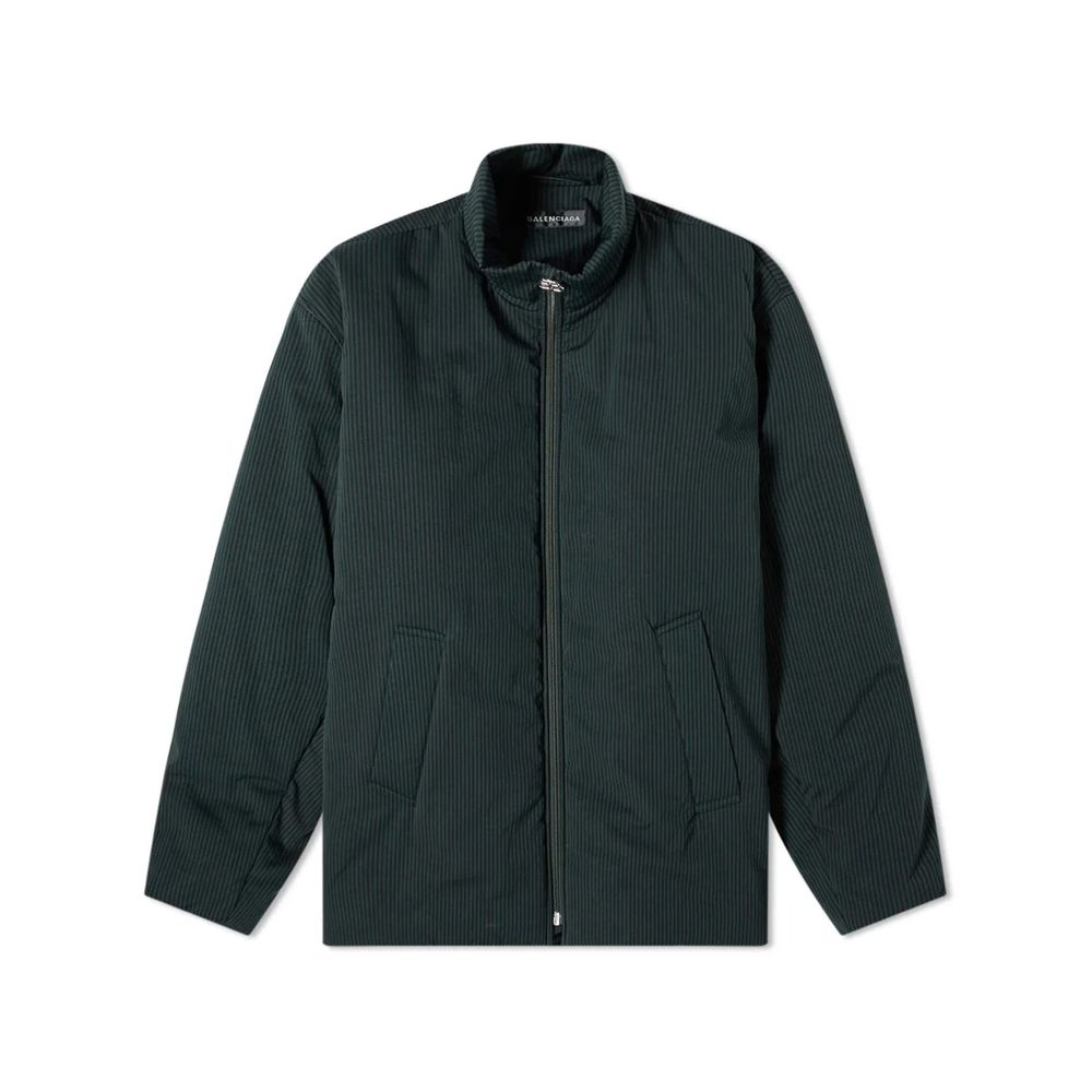 Veste longue noire en coton de Balenciaga, vue de face, avec détails de couture et col élégant, pour un style moderne et sophistiqué.