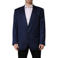 Veste de costume Dolce & Gabbana bleue à double boutonnage et à un seul rang, style élégant et classique.