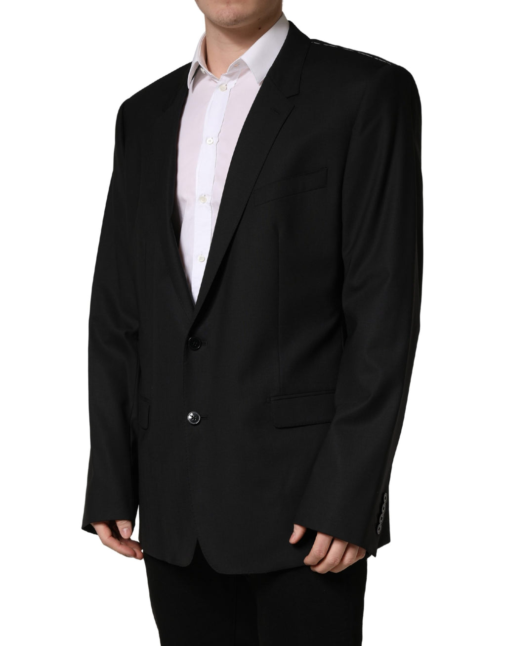 Costume noir Dolce & Gabbana, veste à deux boutons, coupe croisée, tissu élégant, vue de face.