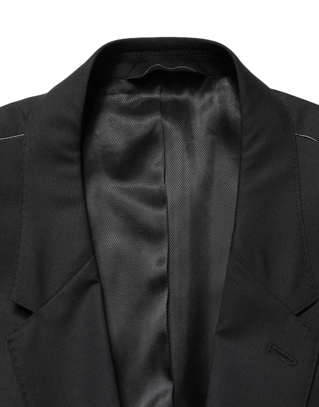 Veste de costume noire Dolce & Gabbana à double boutonnage simple, élégante et sophistiquée, vue en gros plan.