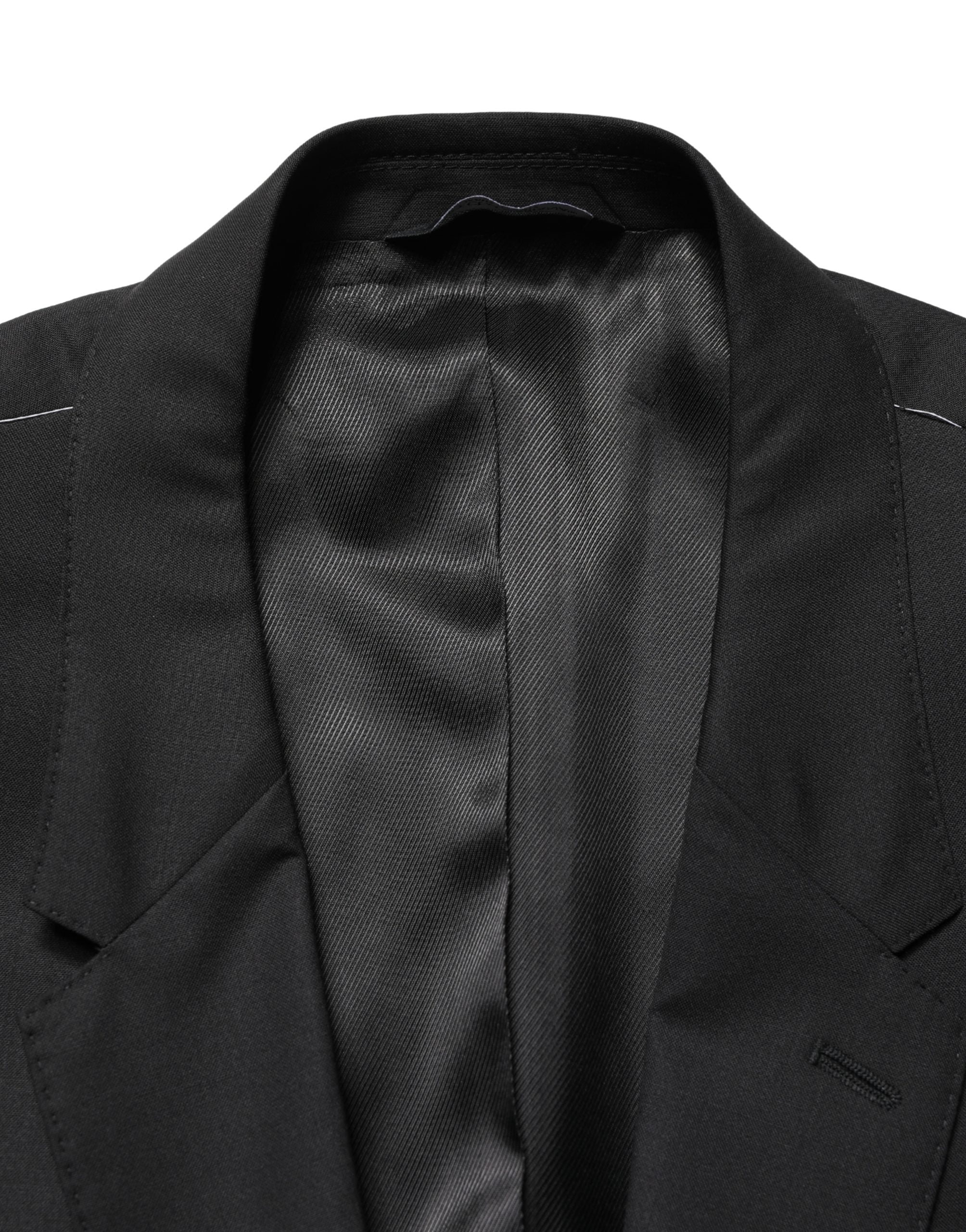 Veste de costume noire Dolce & Gabbana à double boutonnage simple, élégante et sophistiquée, vue en gros plan.