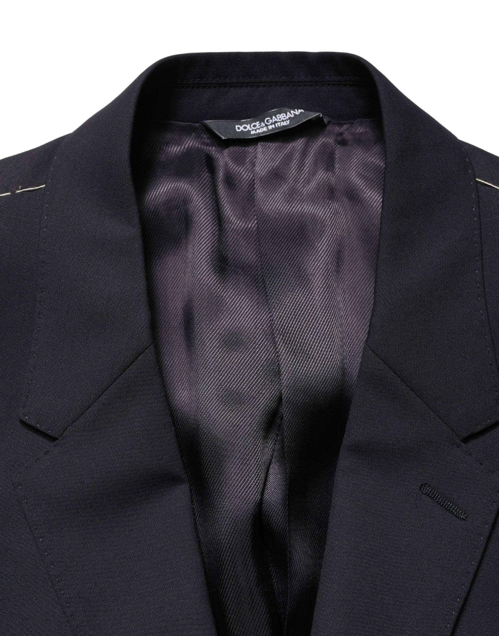 Costume bleu Dolce & Gabbana, veste à deux boutons et coupe simple, vue de face sur mannequin.