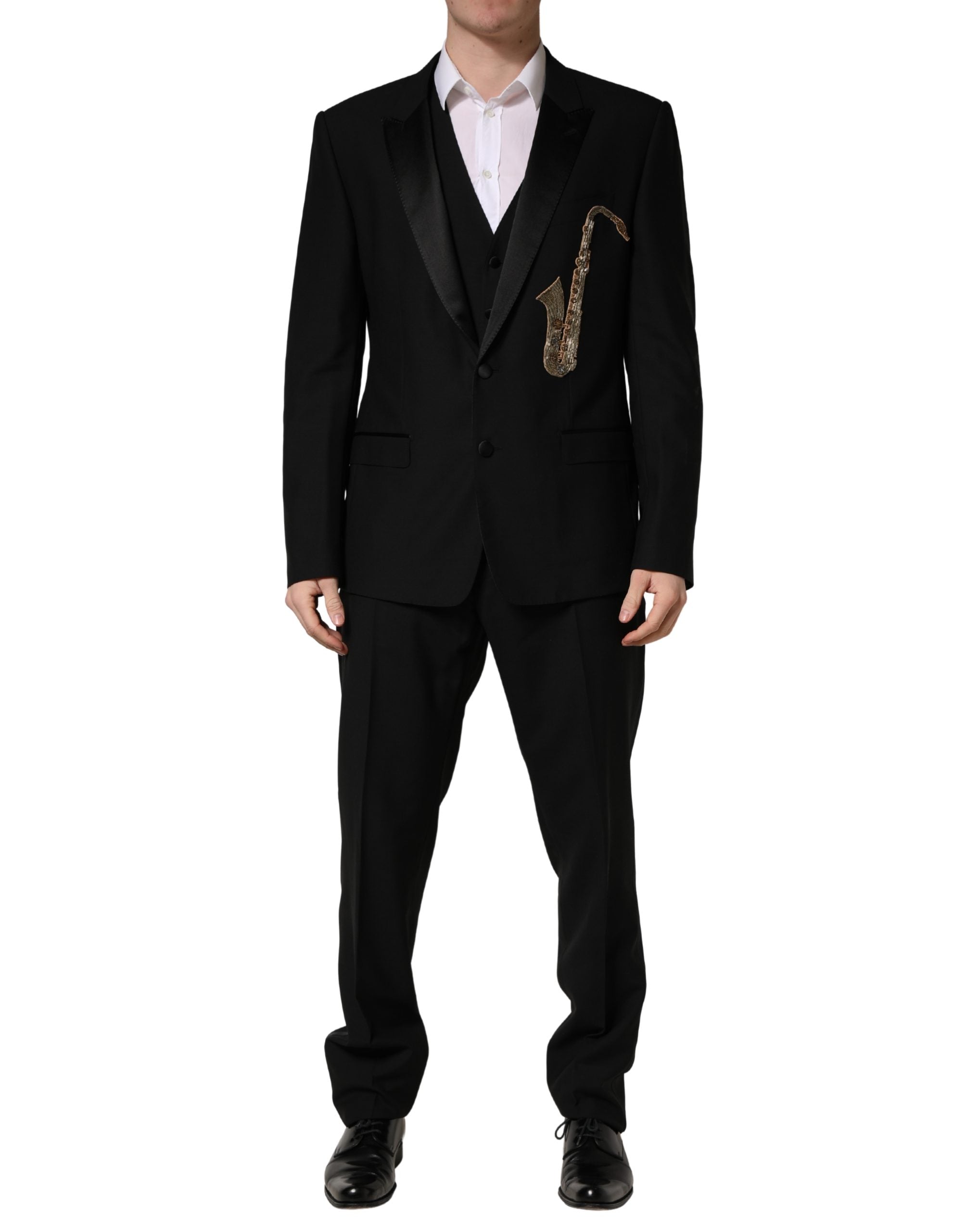 Costume homme Dolce & Gabbana en laine et soie noire, coupe slim, 3 pièces avec veste, pantalon et gilet, pour occasion élégante.