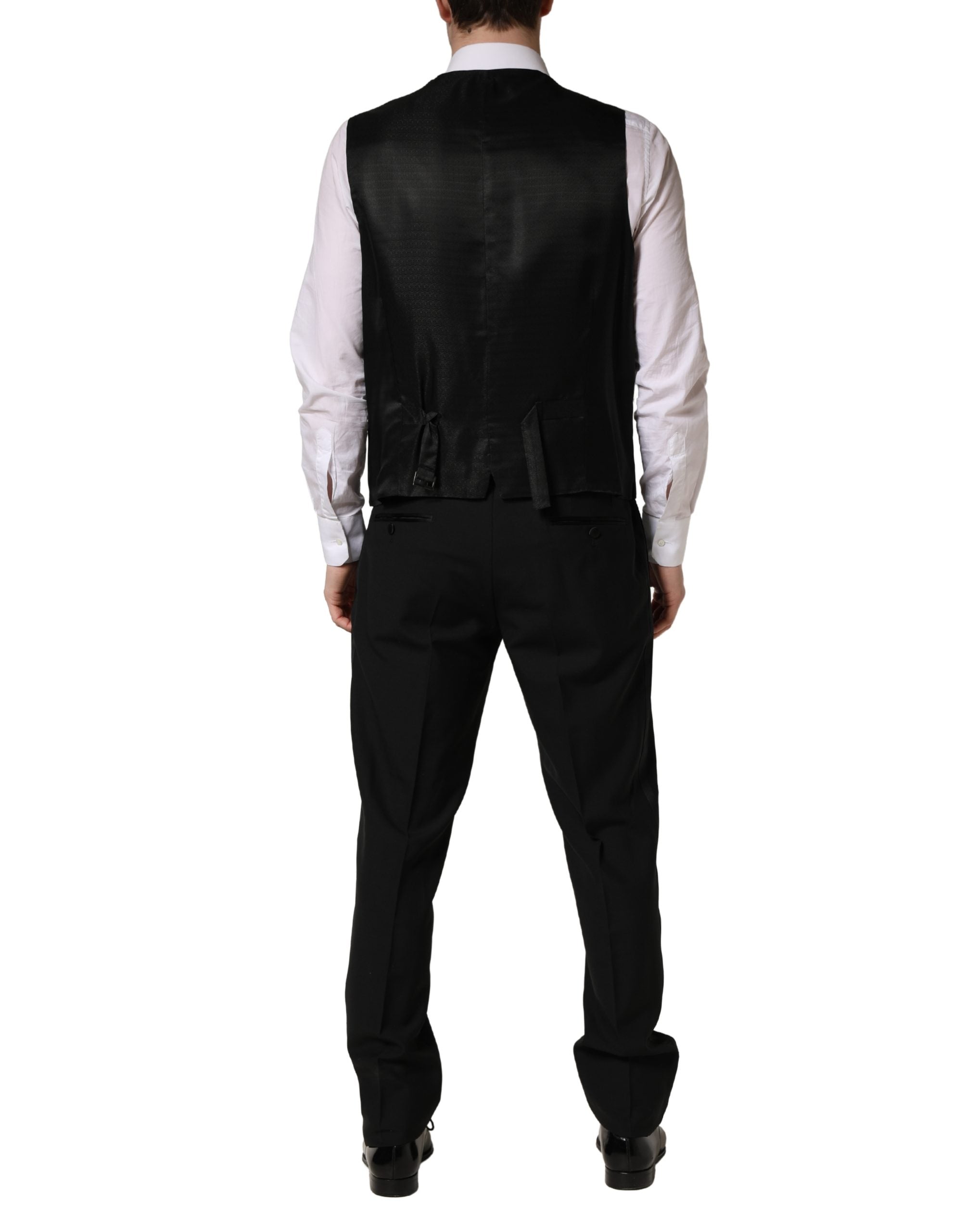 Costume trois pièces en laine et soie noir Dolce & Gabbana, coupe slim pour saxophone, élégant et sophistiqué.