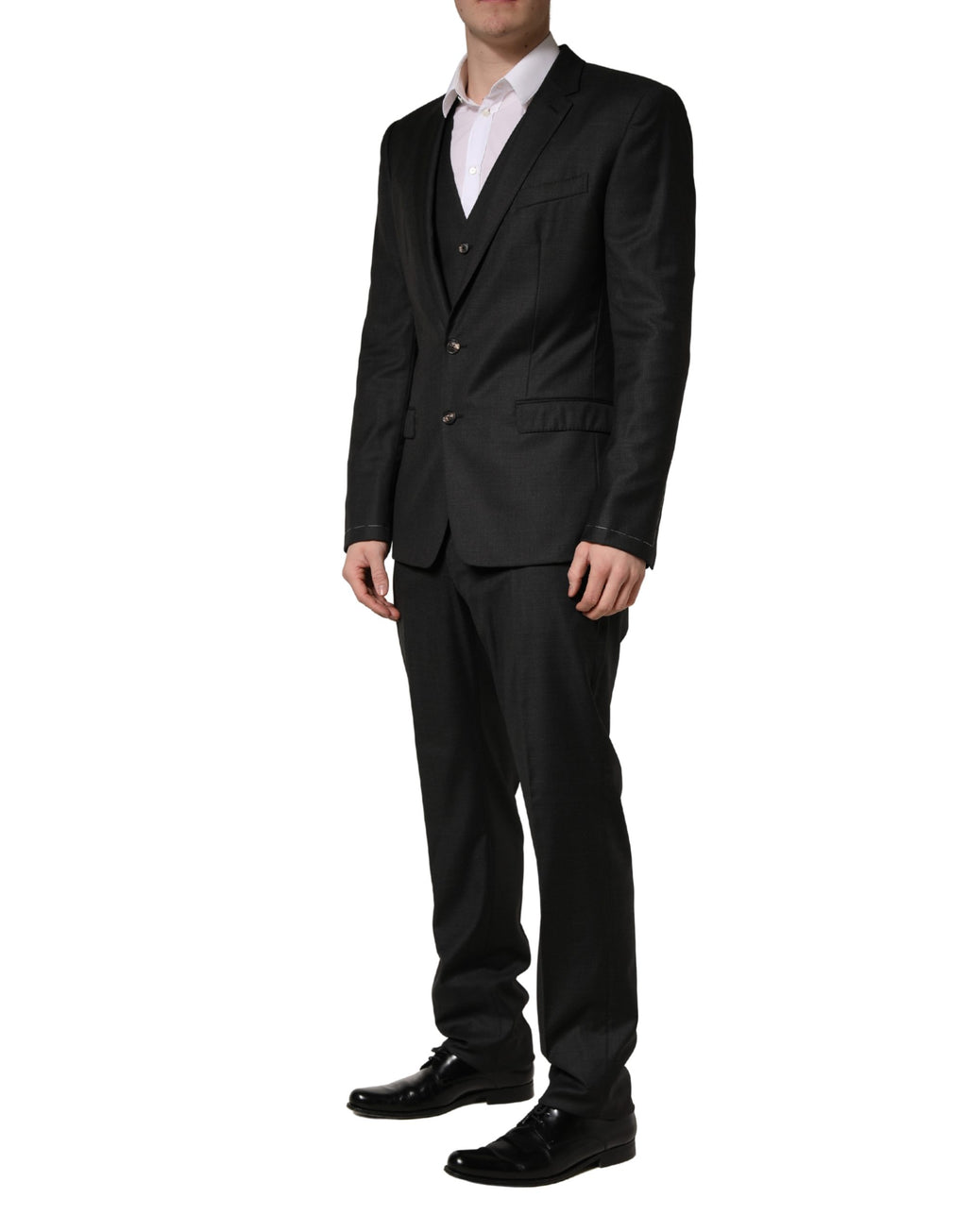 Costume homme en laine noire Dolce & Gabbana, costume trois pièces ajusté et élégant, pour occasions formelles.