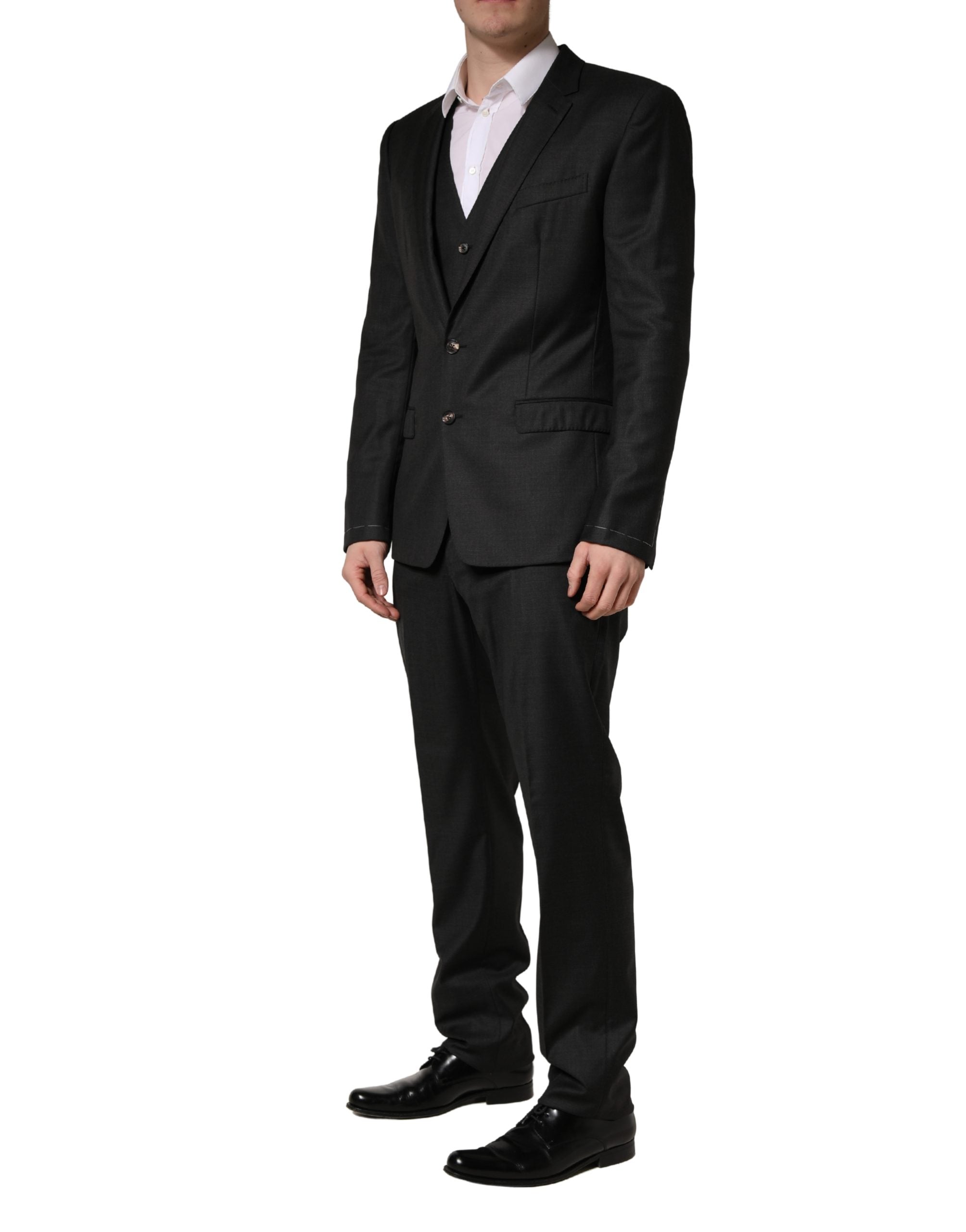 Costume homme en laine noire Dolce & Gabbana, costume trois pièces ajusté et élégant, pour occasions formelles.