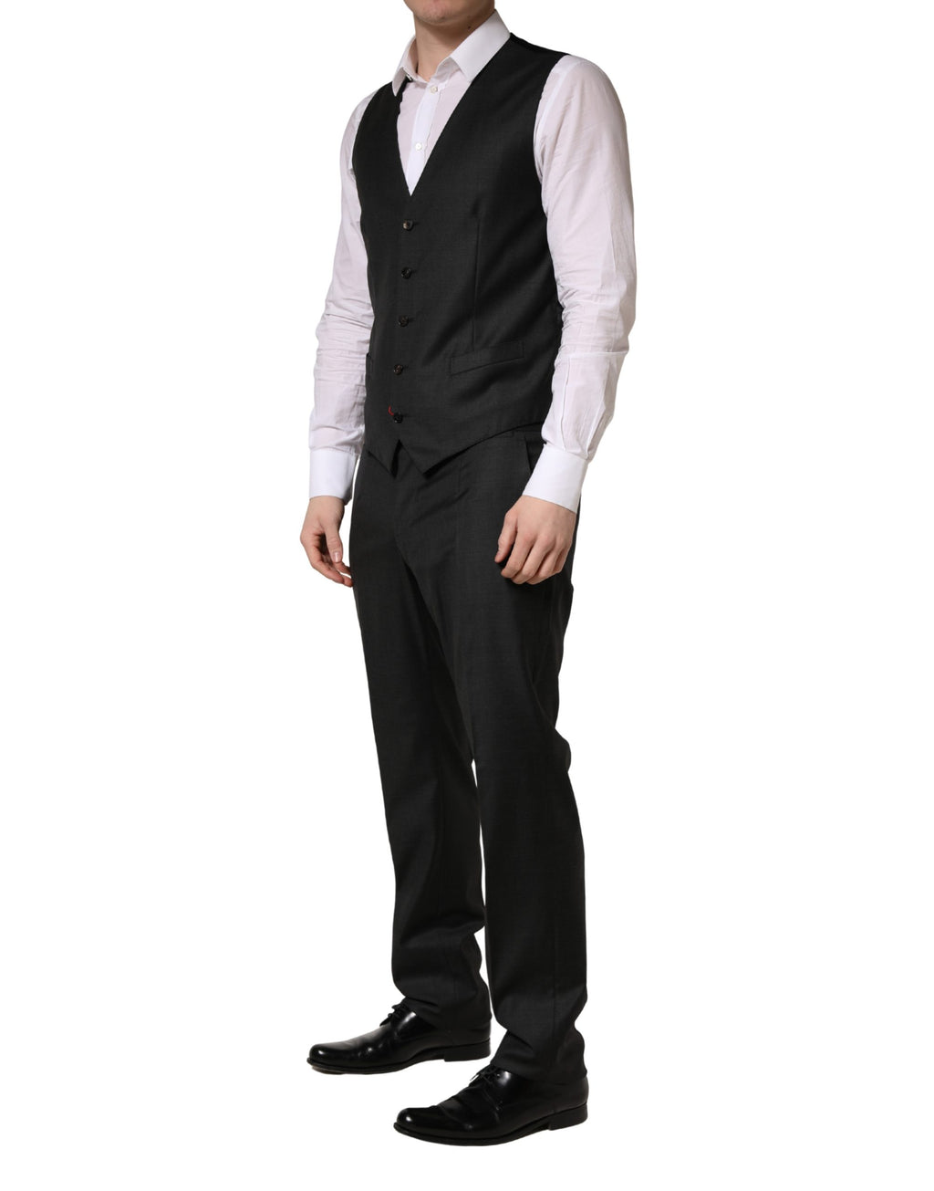 Costume homme trois pièces noir en laine Dolce & Gabbana, coupe slim, vue de face sur mannequin formel.