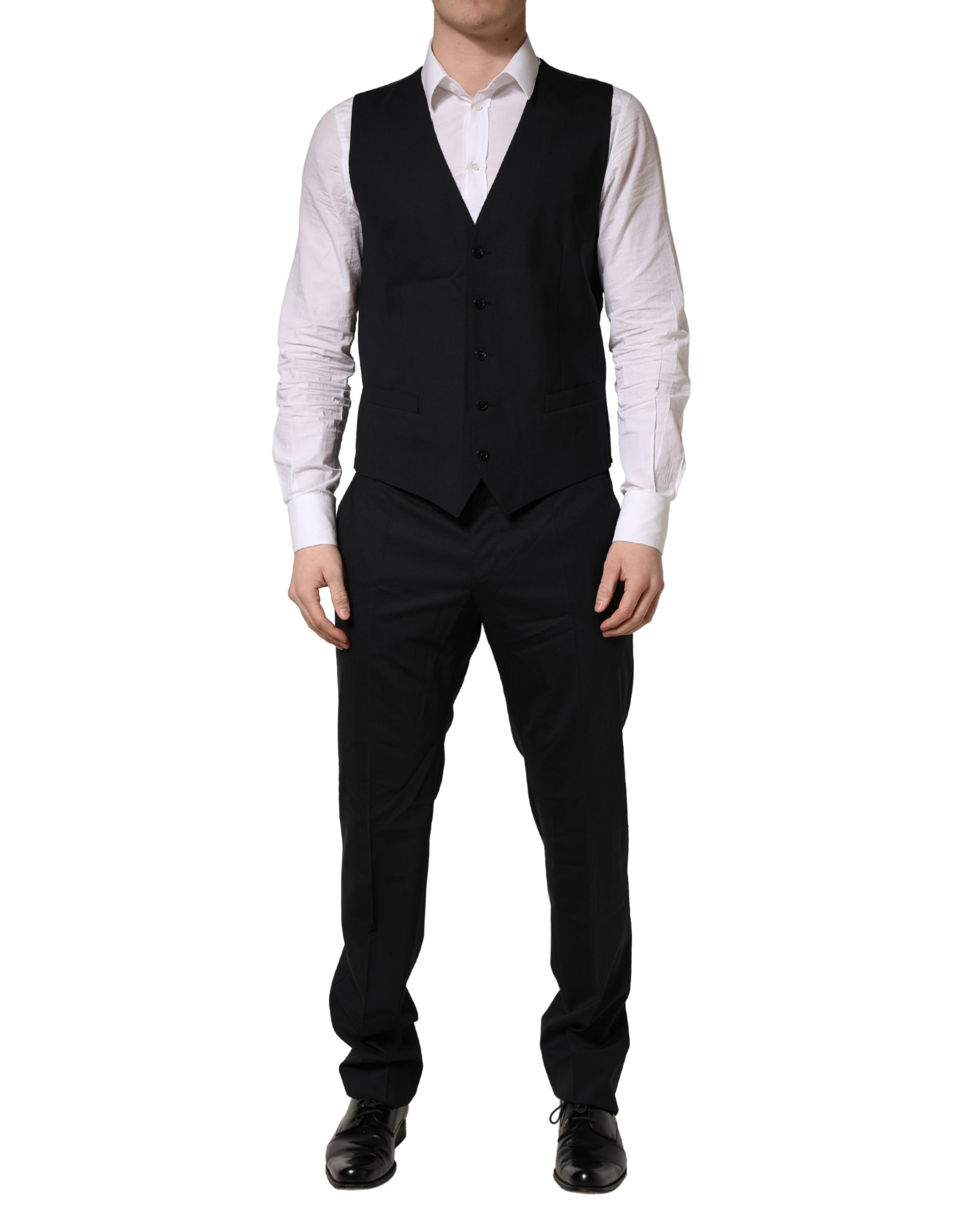 Costume homme formel en laine noire Dolce & Gabbana avec deux boutons, costume trois pièces élégant et sophistiqué.