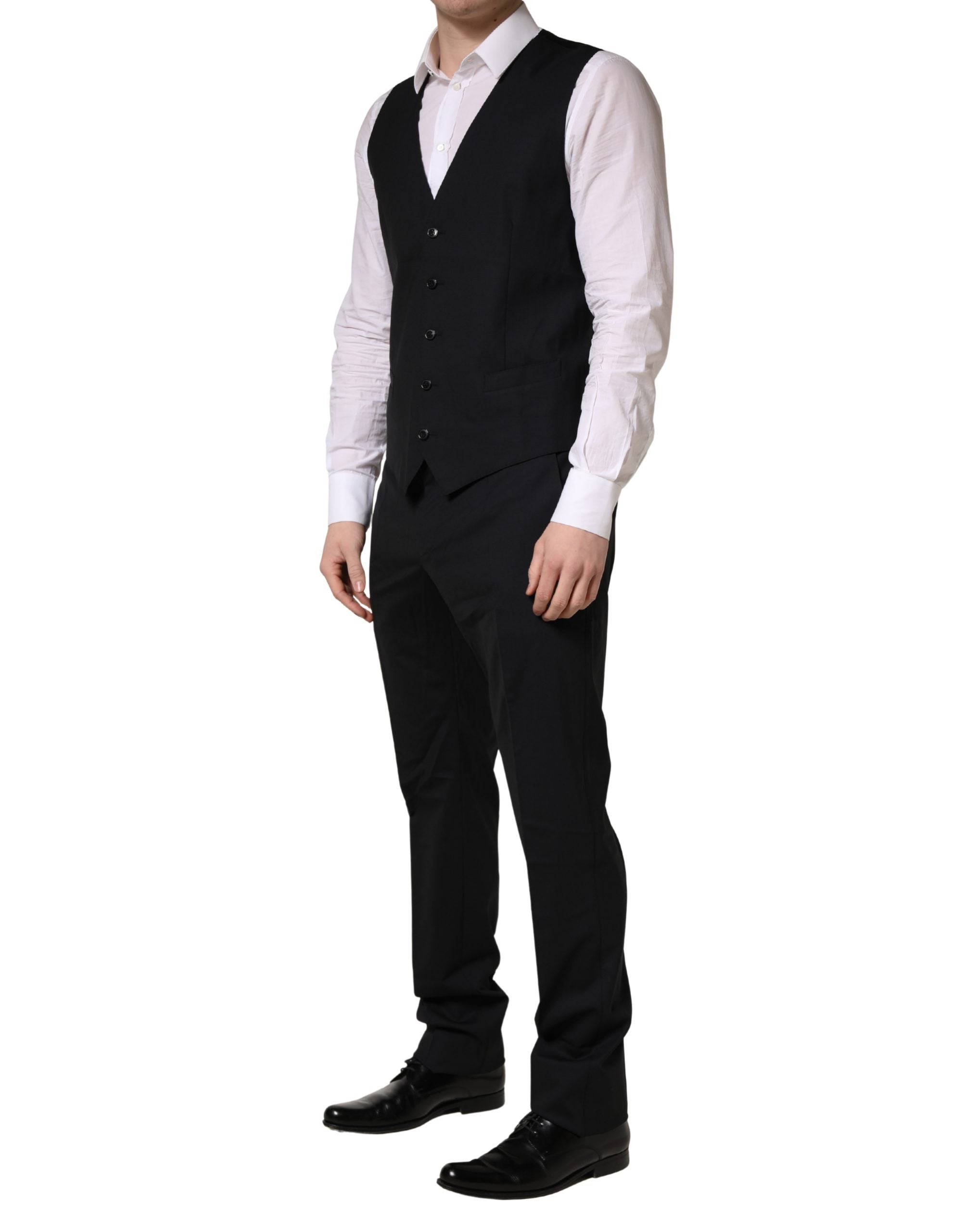 Costume homme en laine noire Dolce & Gabbana, 3 pièces formel avec 2 boutons, élégance et style sophistiqué.