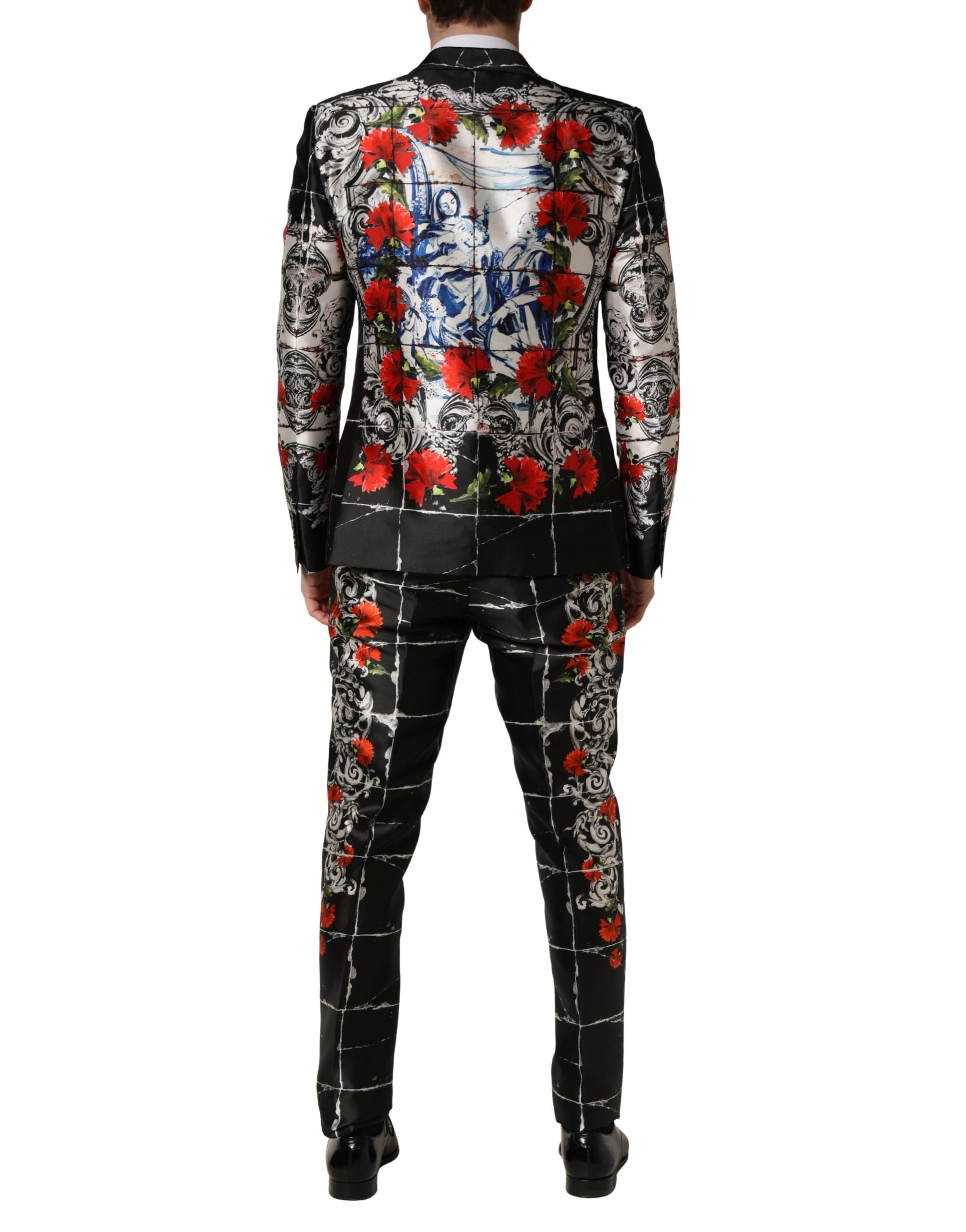 Costume trois pièces noir Dolce & Gabbana avec fleurs, boutons, veste formelle élégante, adapté pour occasions spéciales.