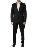 Costume deux pièces en laine noire Dolce & Gabbana avec deux boutons, costume formel élégant pour homme.