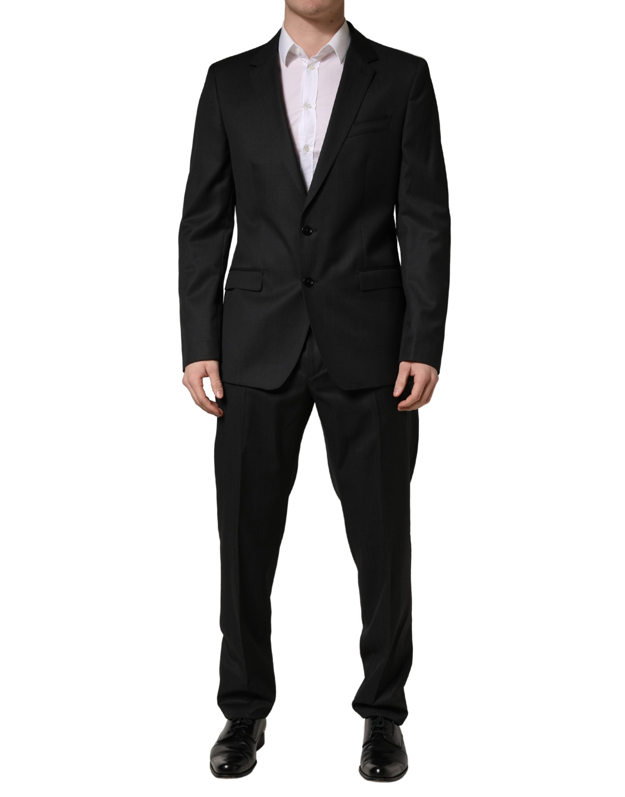 Costume deux pièces en laine noire Dolce & Gabbana avec deux boutons, costume formel élégant pour homme.
