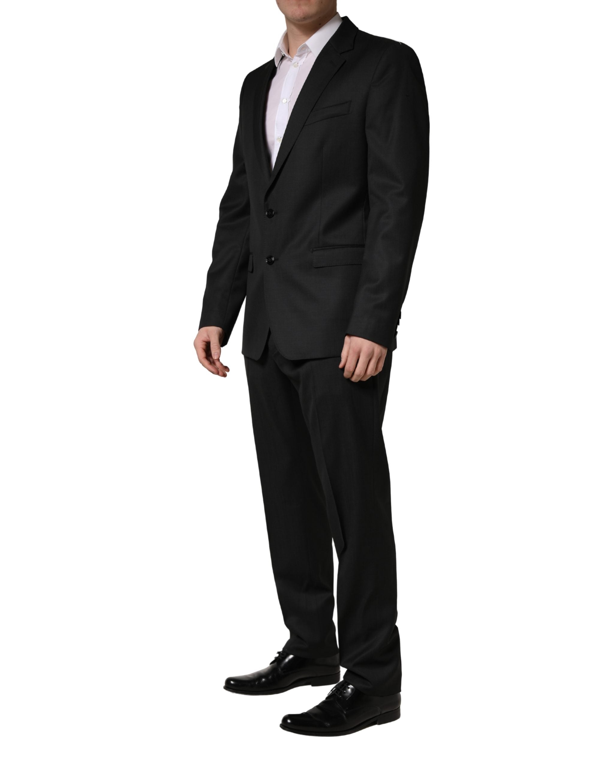 Costume formel homme Dolce & Gabbana en laine noire avec deux boutons, costume deux pièces élégant et sophistiqué.