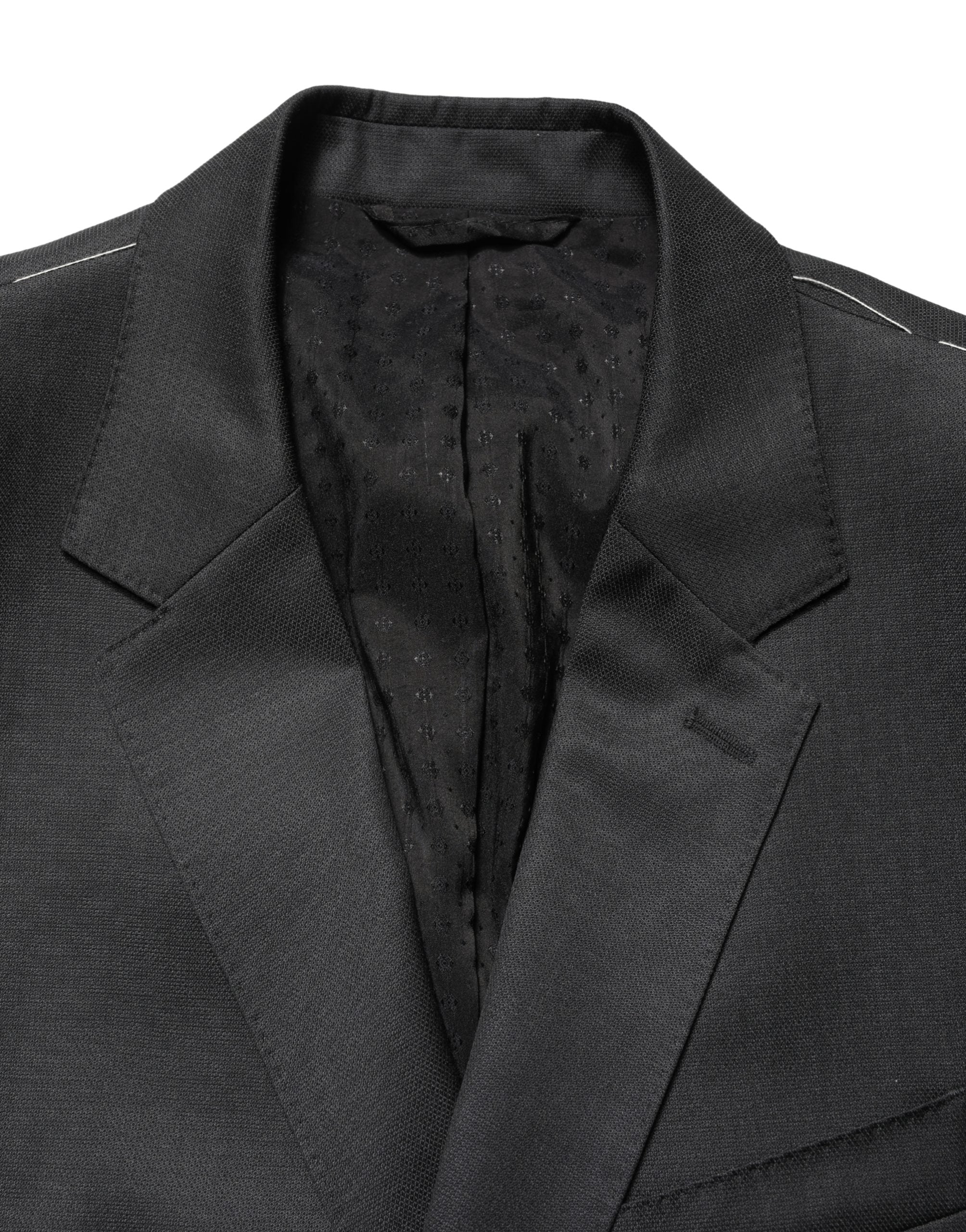 Costume formel deux pièces en laine noire Dolce & Gabbana avec deux boutons, costume élégant pour occasions spéciales.