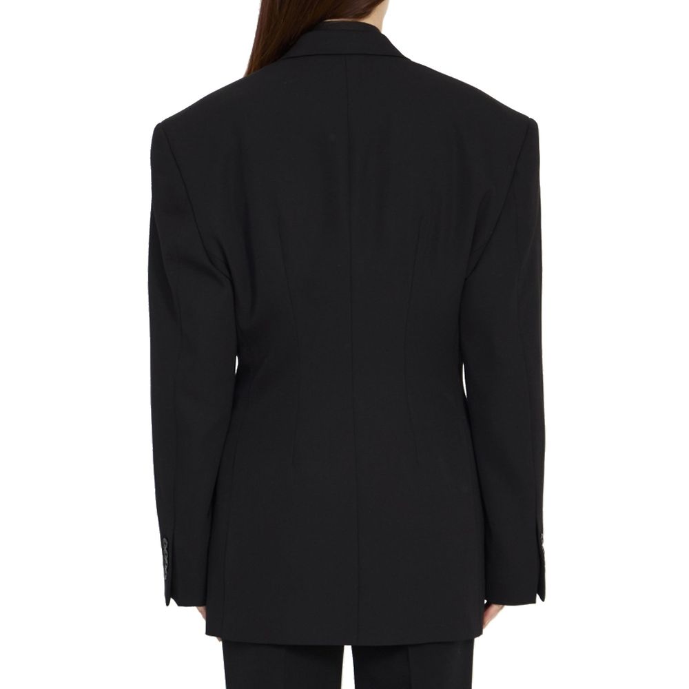 Veste en laine noire Balenciaga, coupe élégante, détails modernes, portée décontractée.