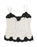 Camisole blanche Dolce & Gabbana avec pois noirs, bordure en dentelle, vêtement d'intérieur élégant et féminin.