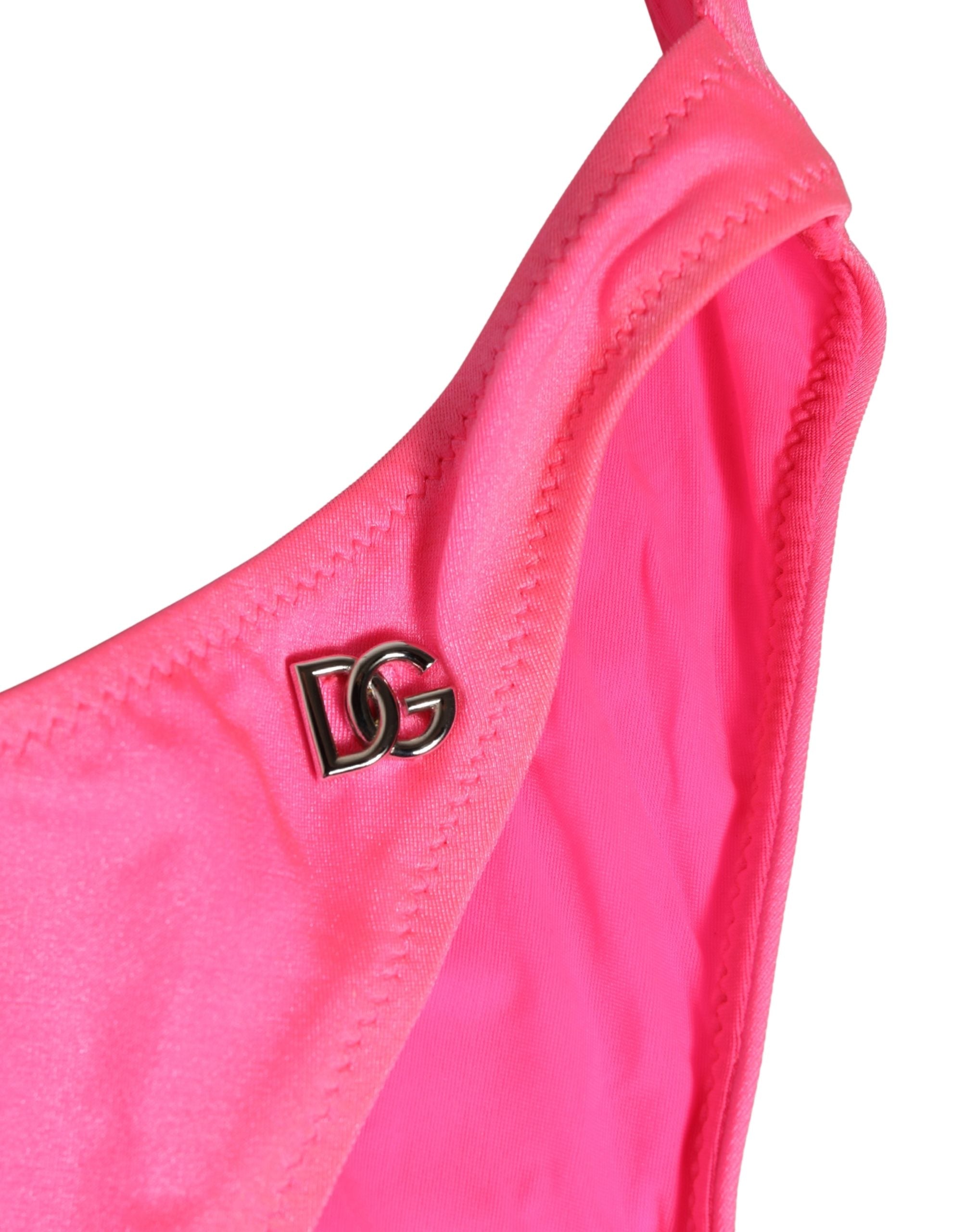 Maillot de bain une pièce Dolce & Gabbana rose à découpes et jambe haute, tissu élégant et style sophistiqué.