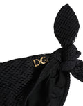 Bas de bikini noir Dolce & Gabbana avec liens sur les côtés et logo DG, parfait pour la plage et la baignade.