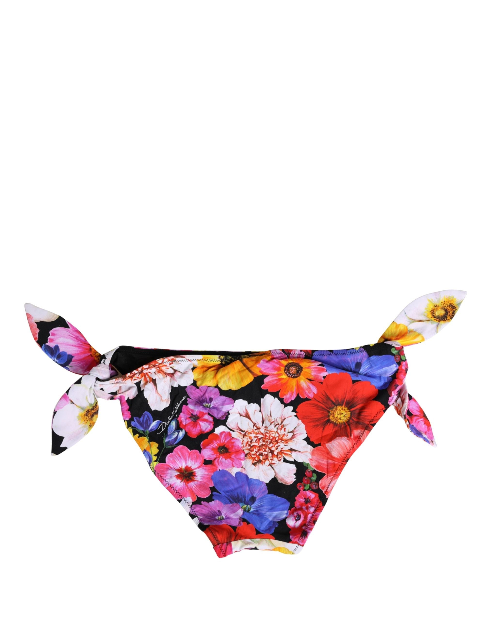 Bas de maillot de bain noir à fleurs Dolce & Gabbana, style bikini, tissu extensible et motifs floraux élégants.