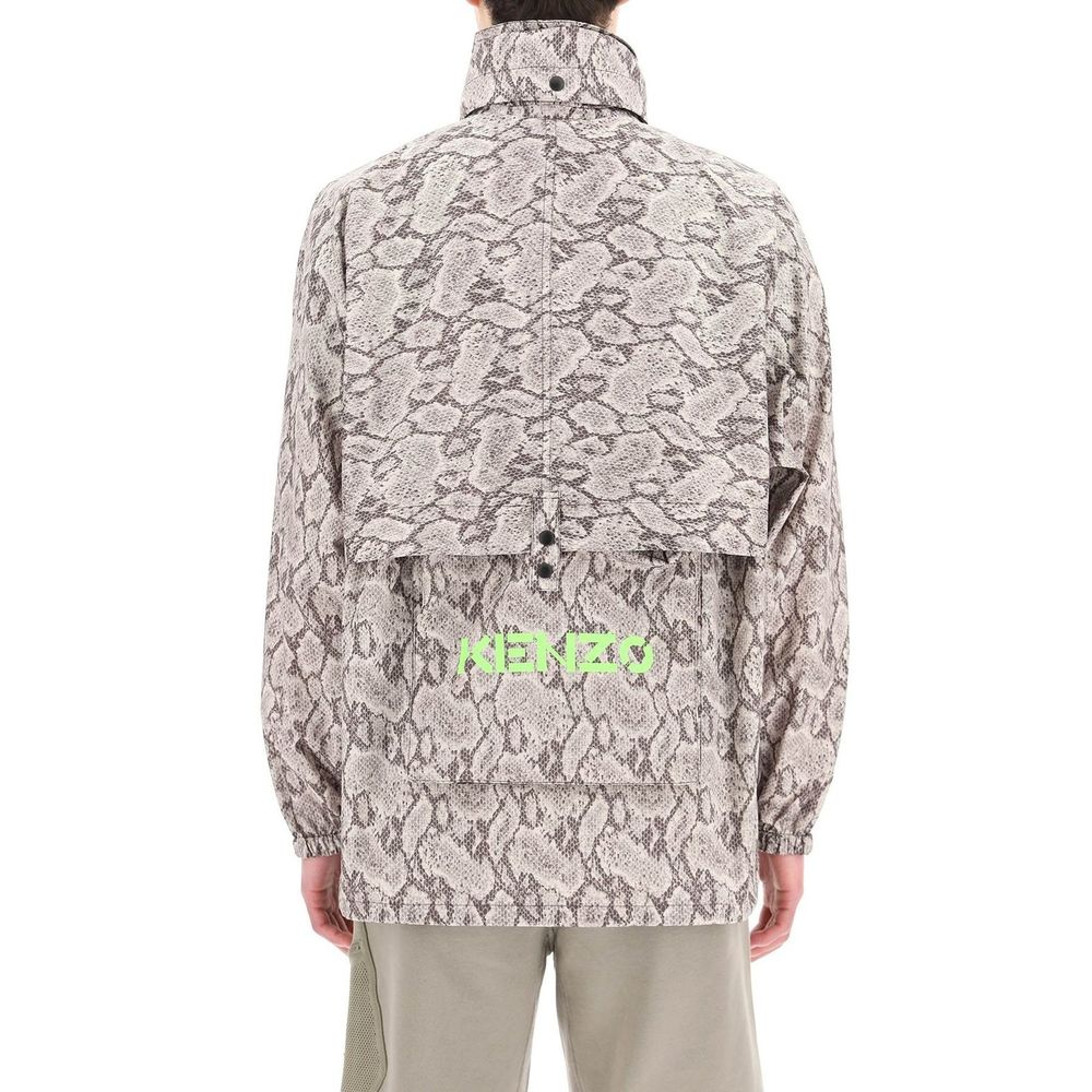 Veste en polyester beige de Kenzo, coupe moderne, avec capuche et fermeture éclair, aspect tendance et élégance.