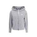 Veste en polyamide bleue Prada, coupe-vent légère avec capuche, idéale pour la pluie et le style urbain.