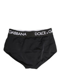 Culotte Dolce & Gabbana noire avec ceinture logo, style coulotte, sous-vêtements élégants en tissu doux visible en détail.