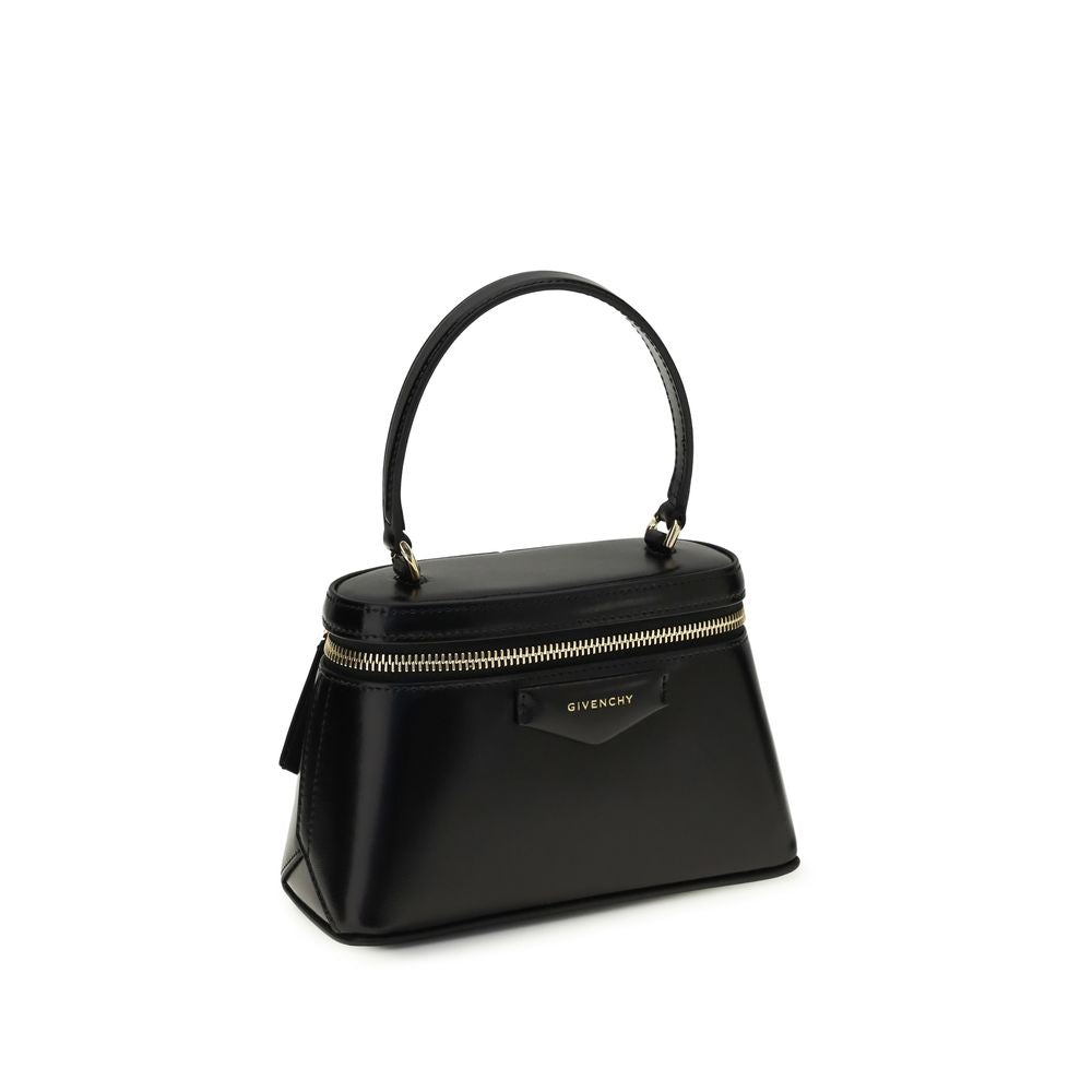Sac à main Givenchy Bos Taurus en cuir noir pour femme, avec poignées en cuir et détails élégants.