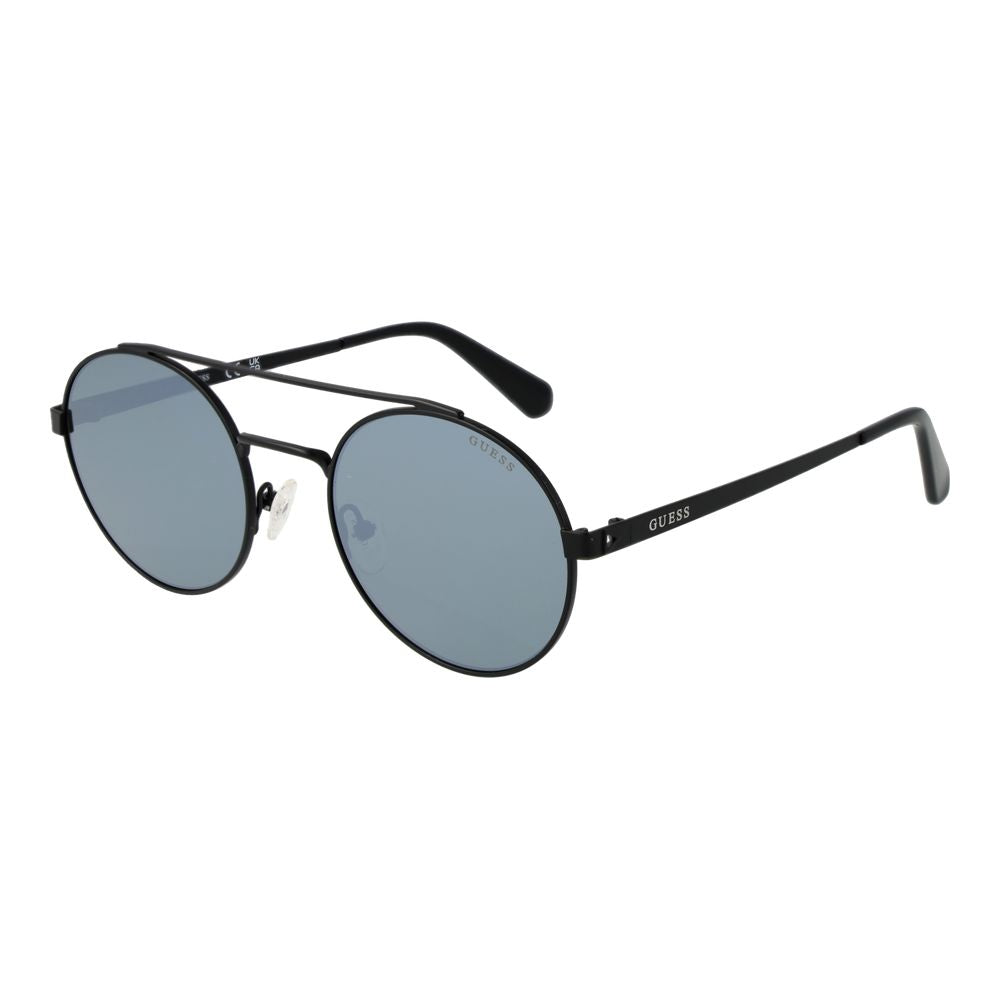 Lunettes de soleil Guess en métal noir avec monture élégante et branches minces, style moderne et tendance.