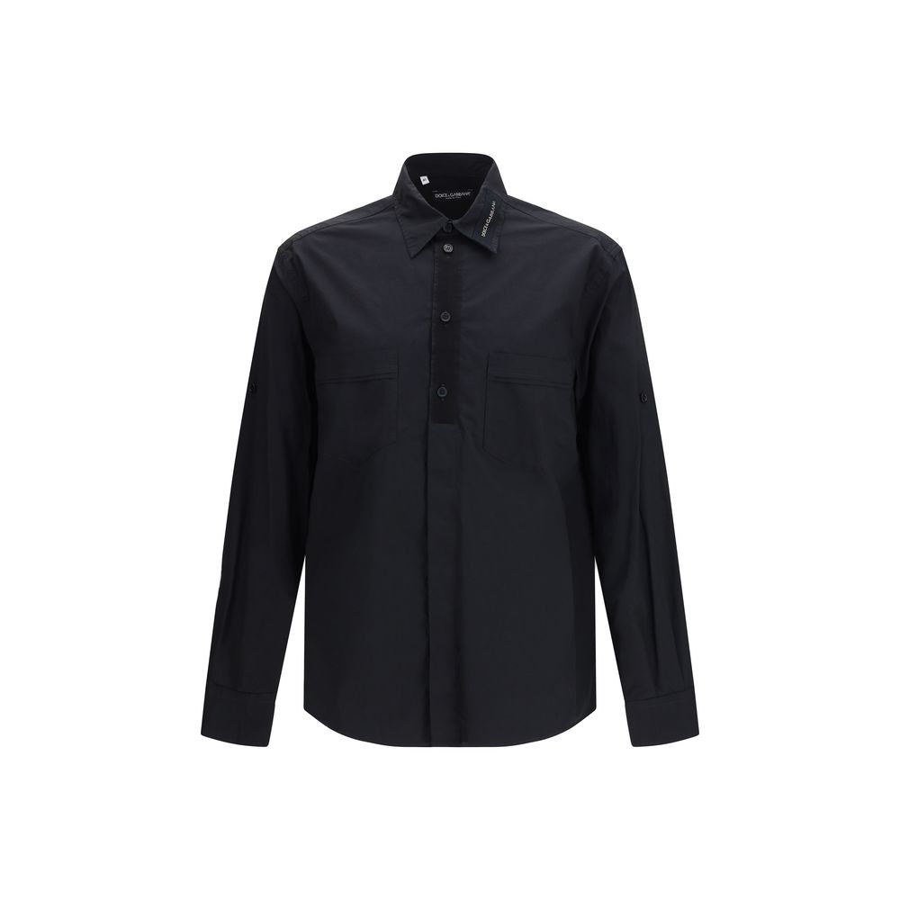 Chemise noire en coton de la marque Dolce & Gabbana, coupe classique avec col et boutons visibles.
