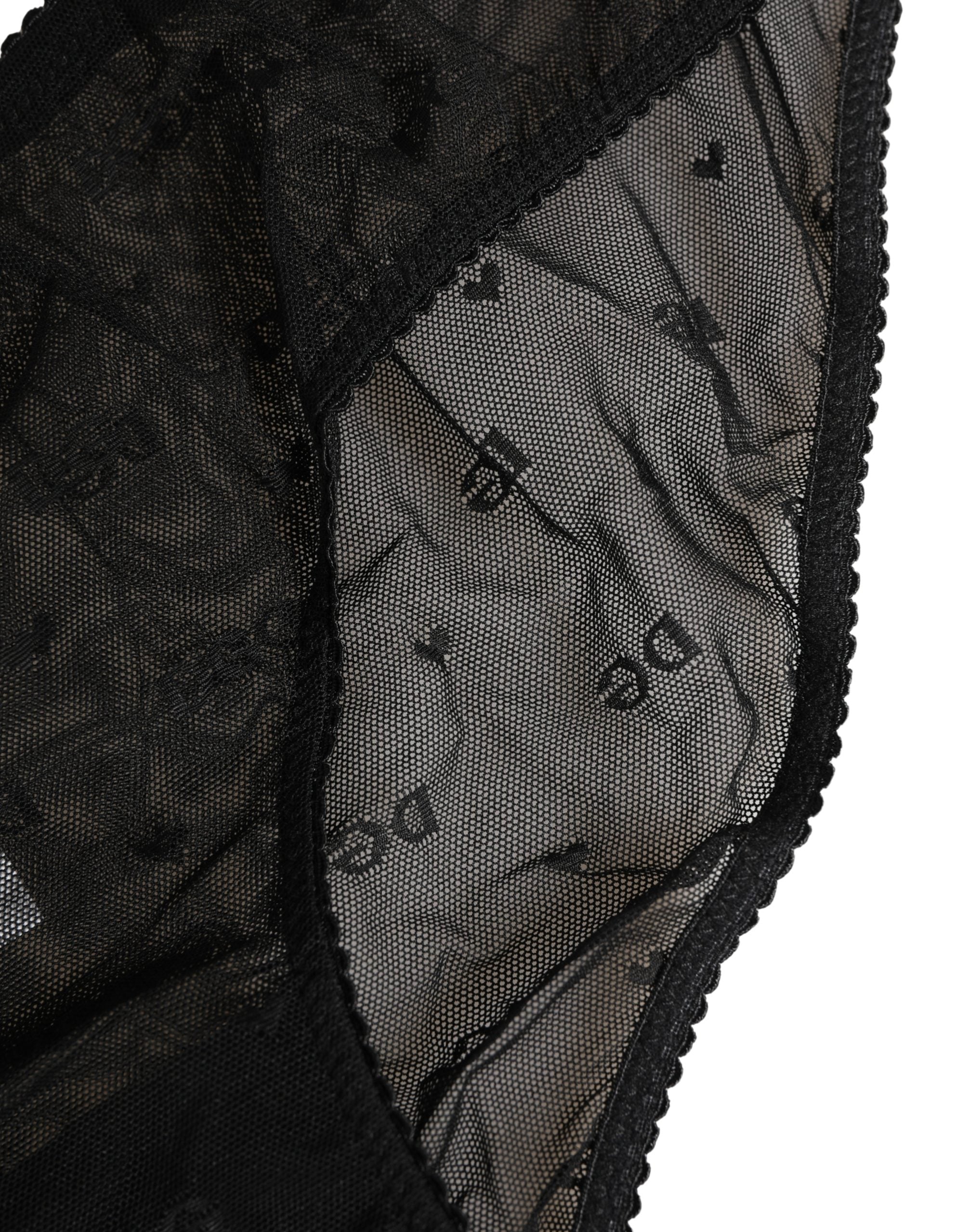 Culotte noire en dentelle fine et mesh transparent de Dolce & Gabbana, avec logo visible, adaptée pour un style élégant.