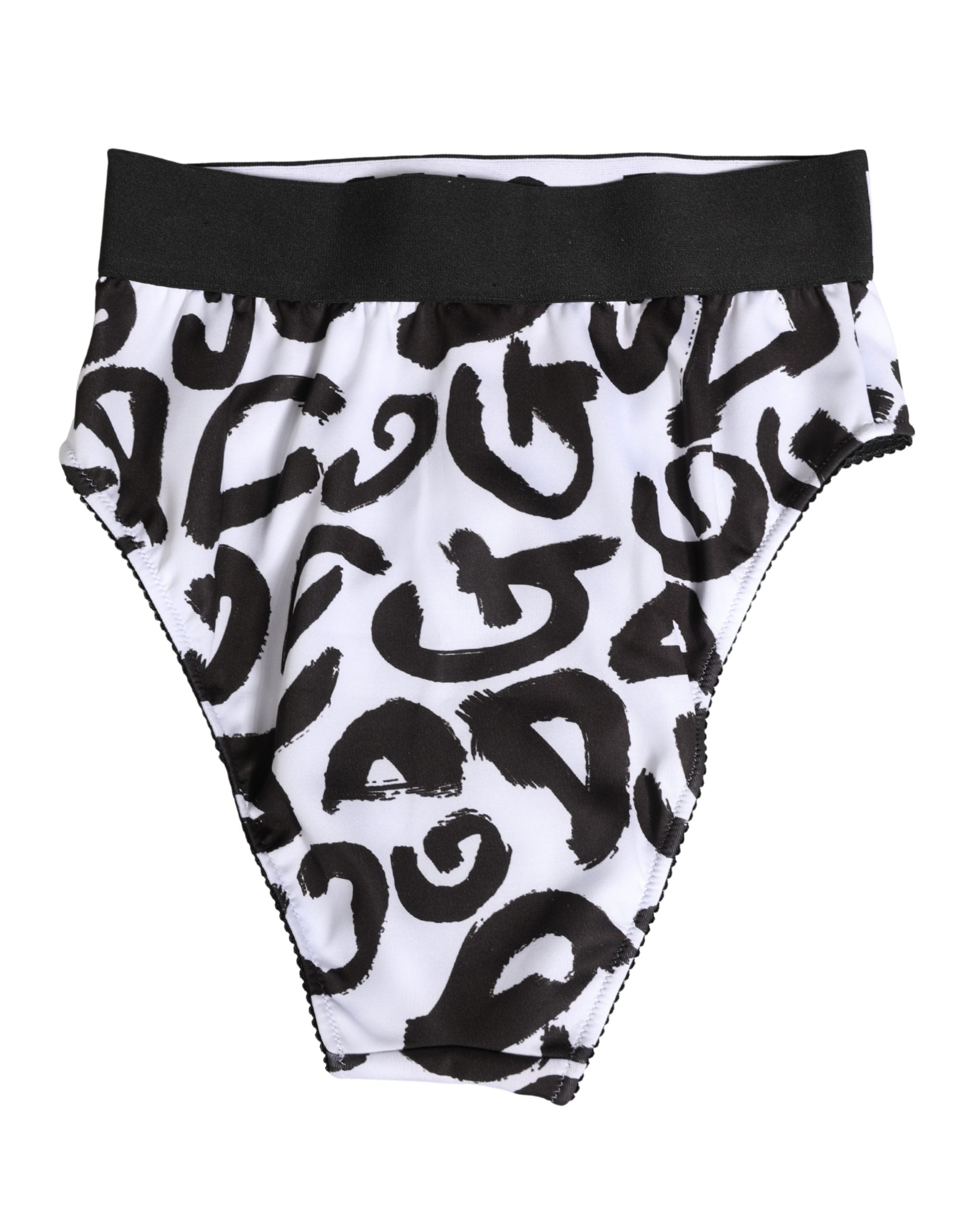 Sous-vêtements Dolce & Gabbana, culotte haute noire et blanche avec logo graphique, visible sur l’image.