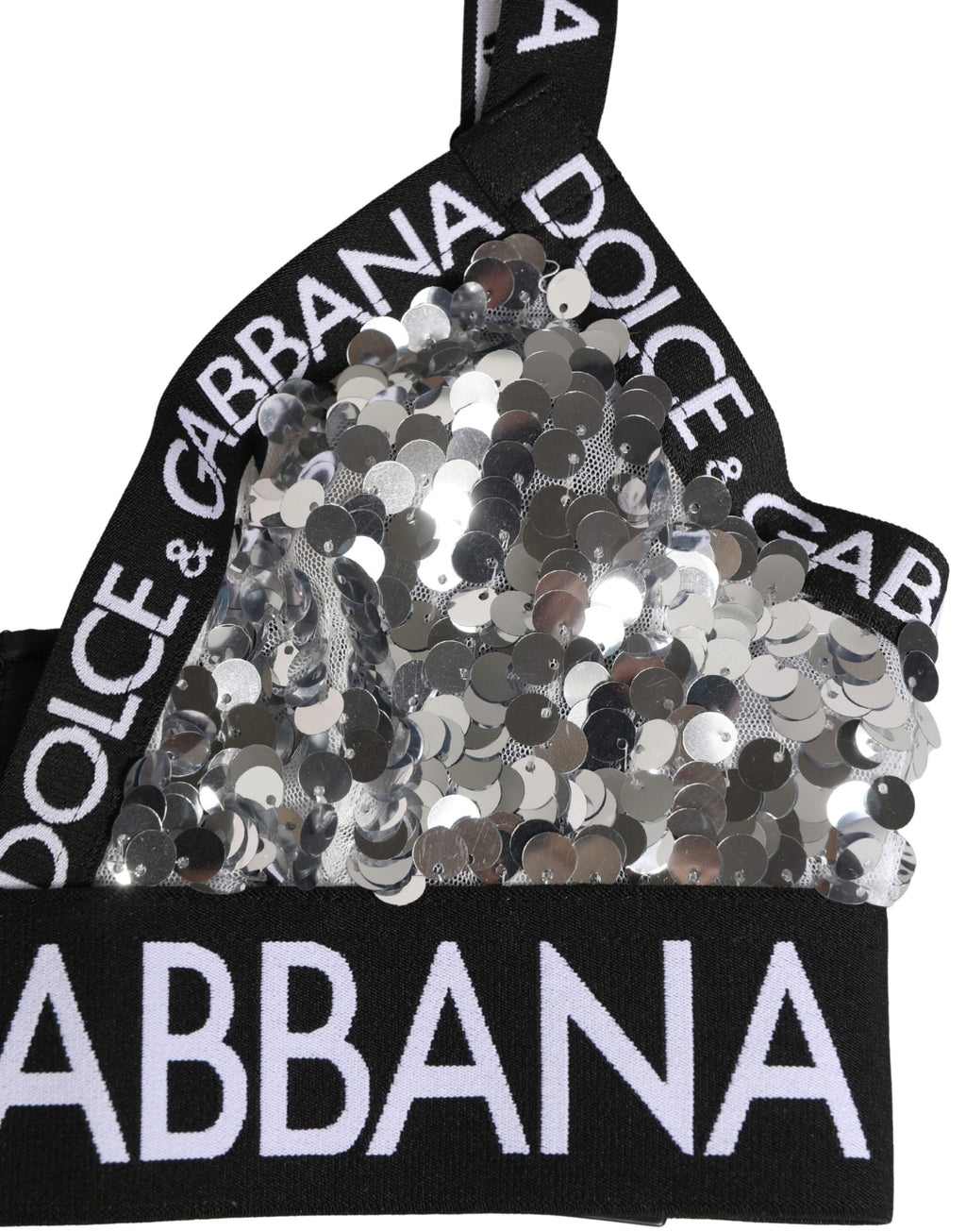 Soutien-gorge triangle en dentelle argentée Dolce & Gabbana avec sequins, coupe douce et finition élégante.