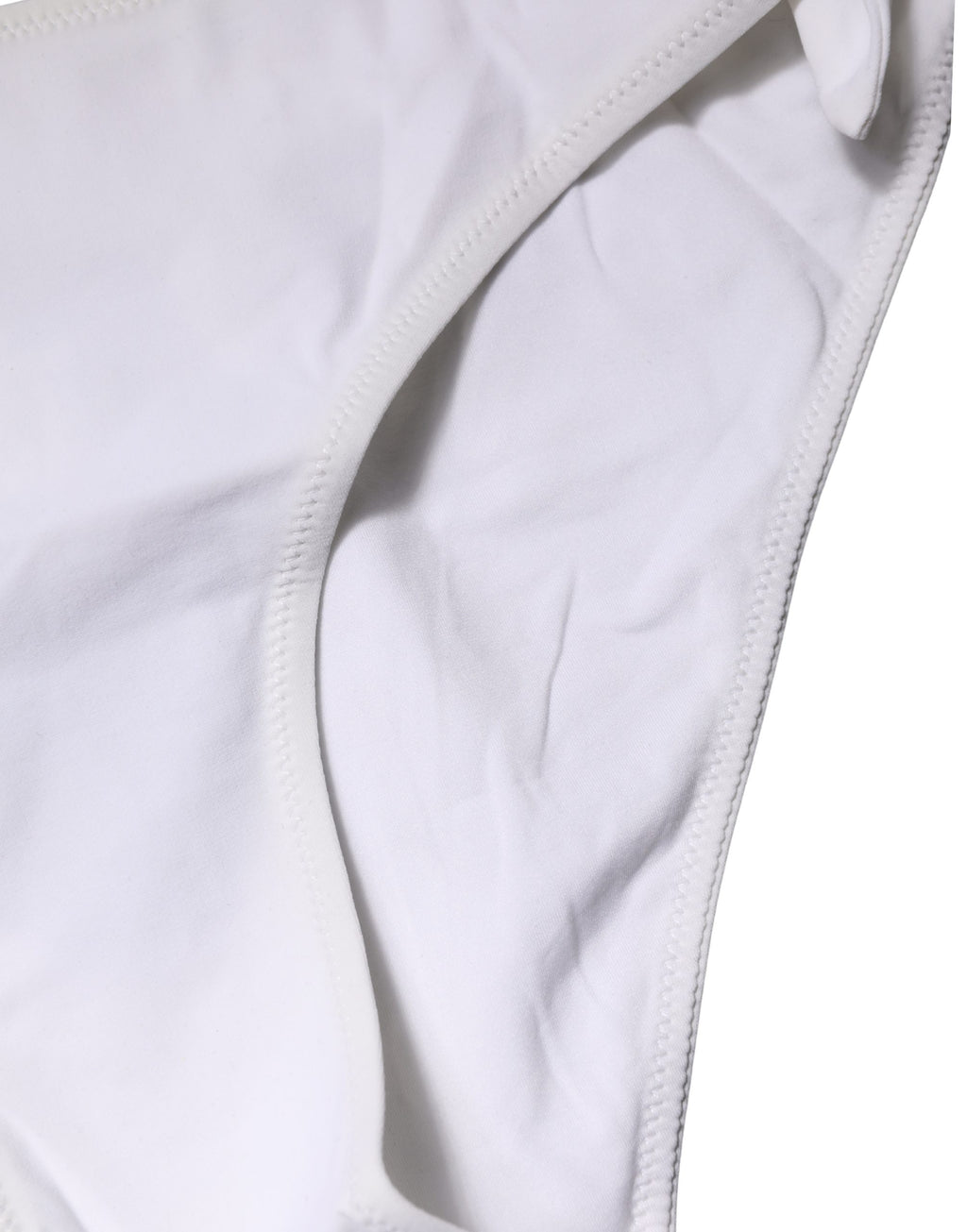 Bas de bikini blanc Dolce & Gabbana avec liens sur les côtés, parfait pour la plage ou la piscine.