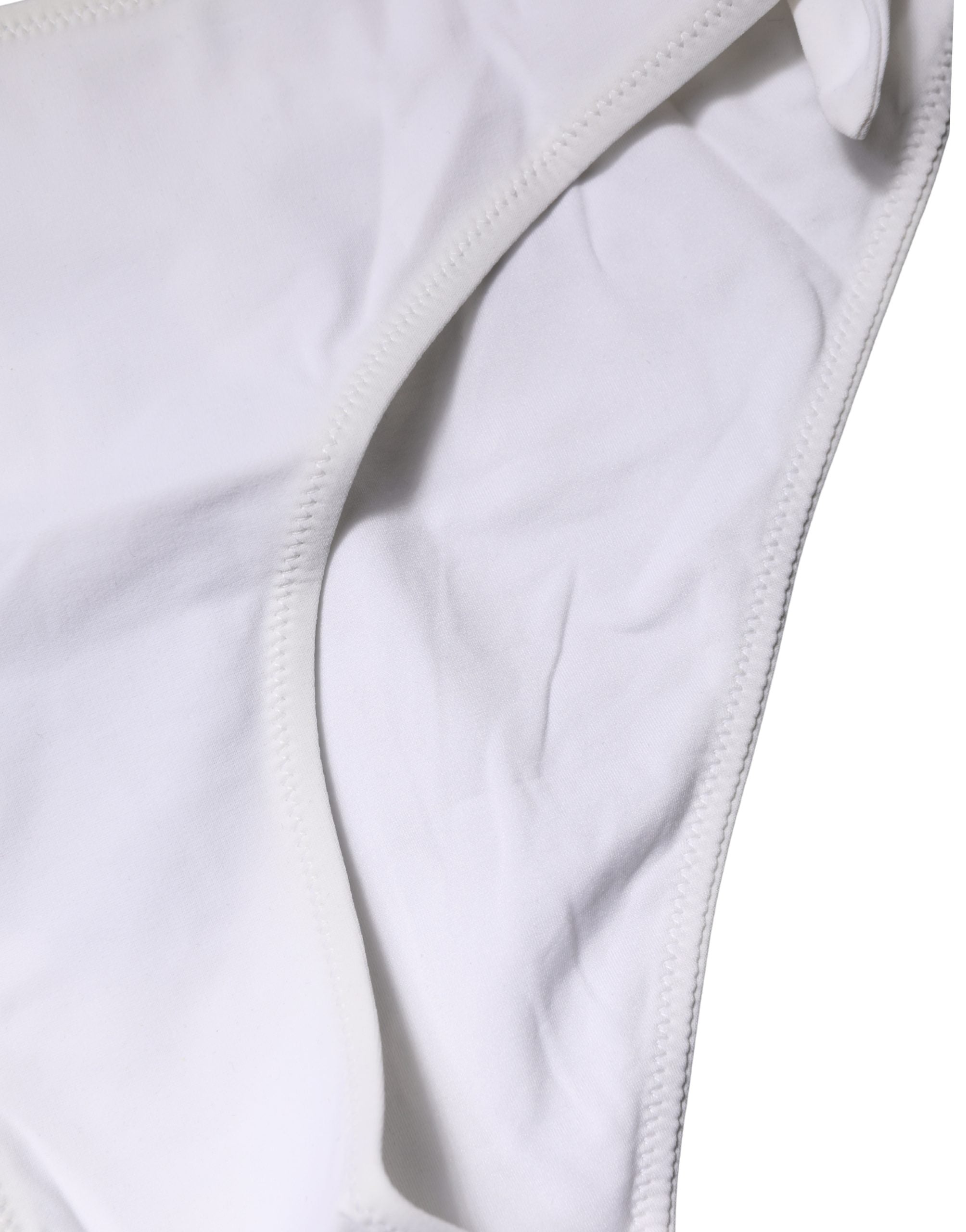 Bas de bikini blanc Dolce & Gabbana avec liens sur les côtés, parfait pour la plage ou la piscine.