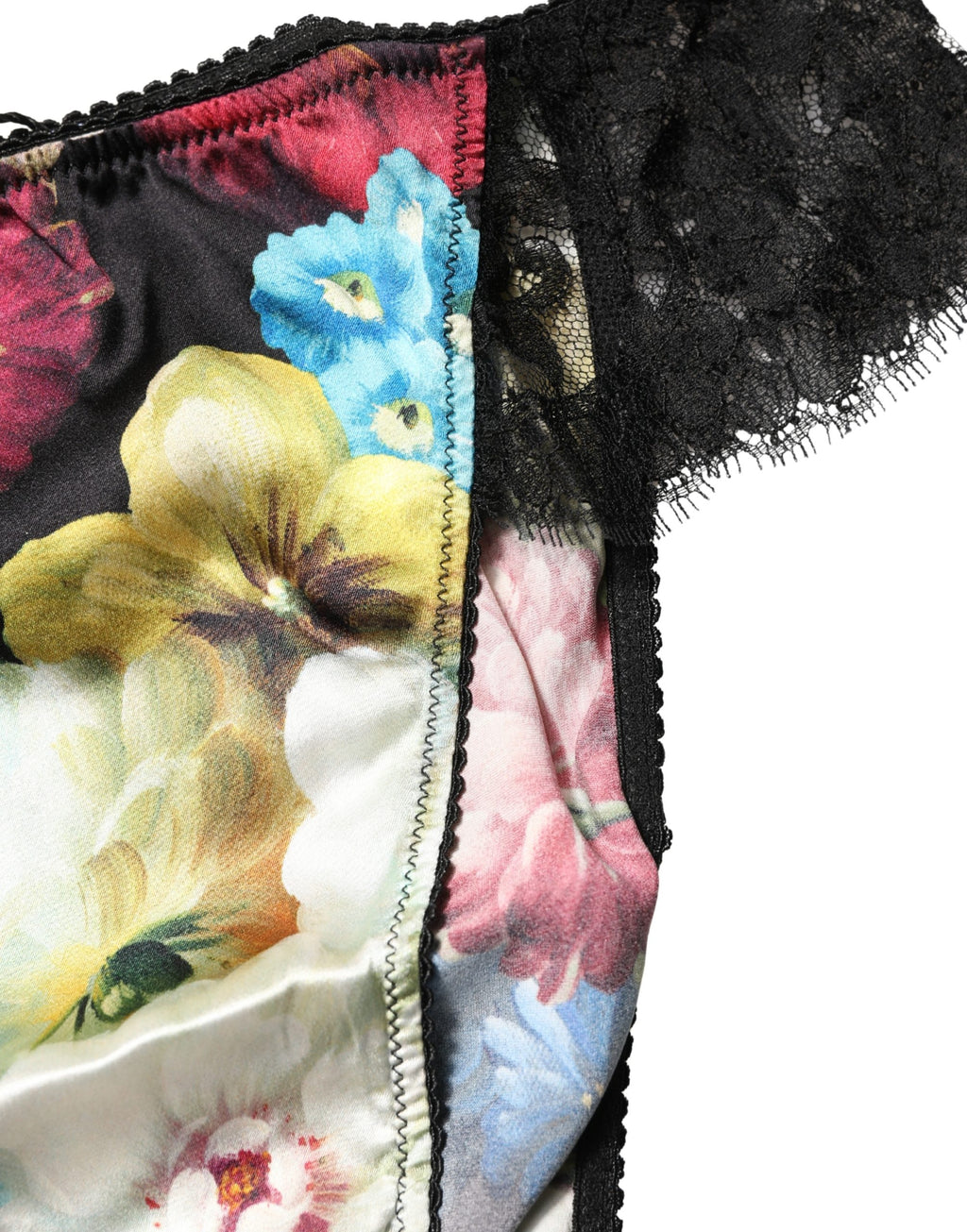 Slip en dentelle noire Dolce & Gabbana, culotte taille mi-haute avec motifs floraux élégants et finition raffinée.