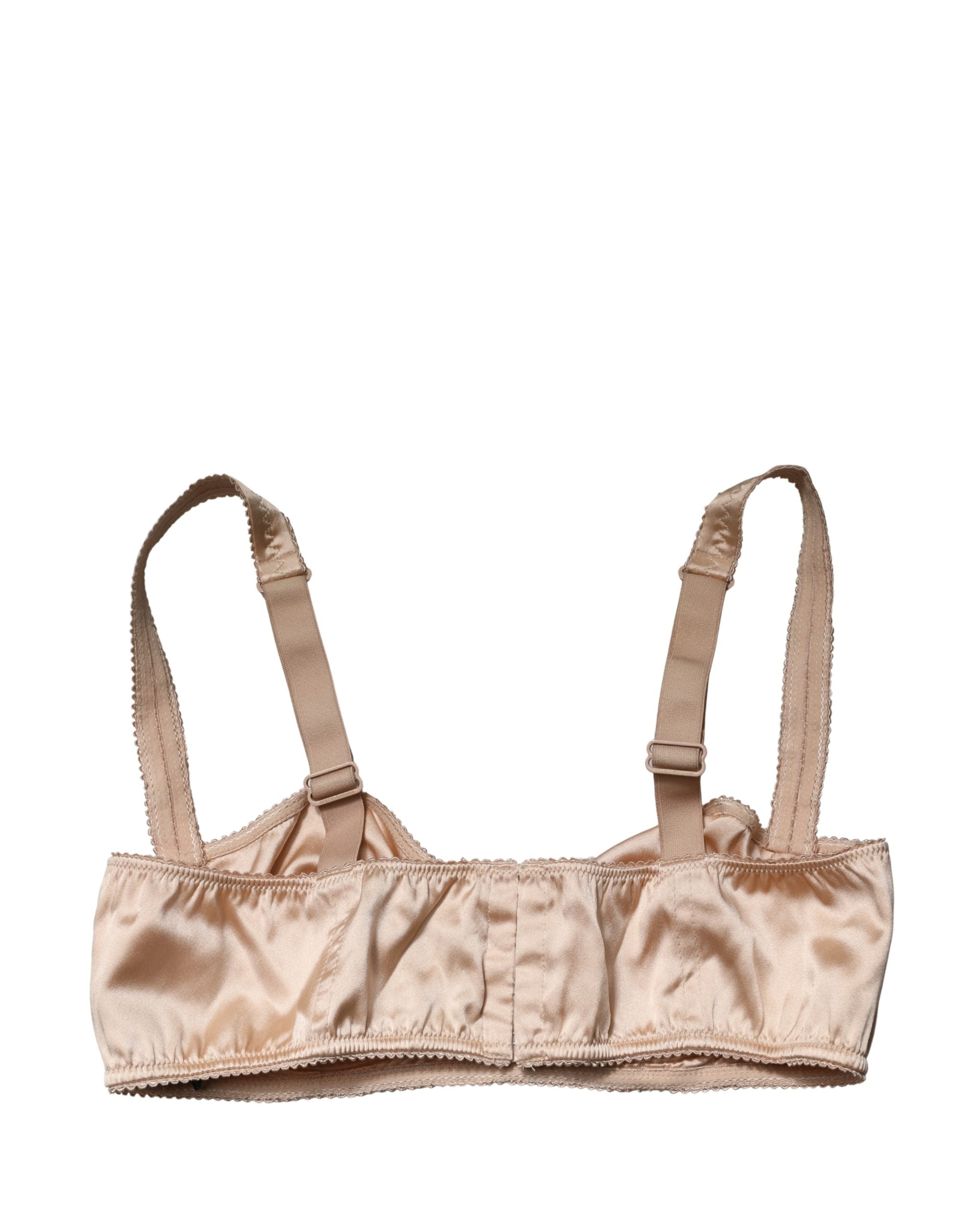 Soutien-gorge balconnet beige Dolce & Gabbana avec armatures semi-rembourrées et design élégant visible sur l’image.