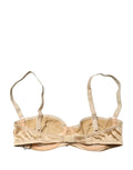 Soutien-gorge balconnet beige Dolce & Gabbana avec armatures, semi-rembourré et design élégant visible sur l'image.