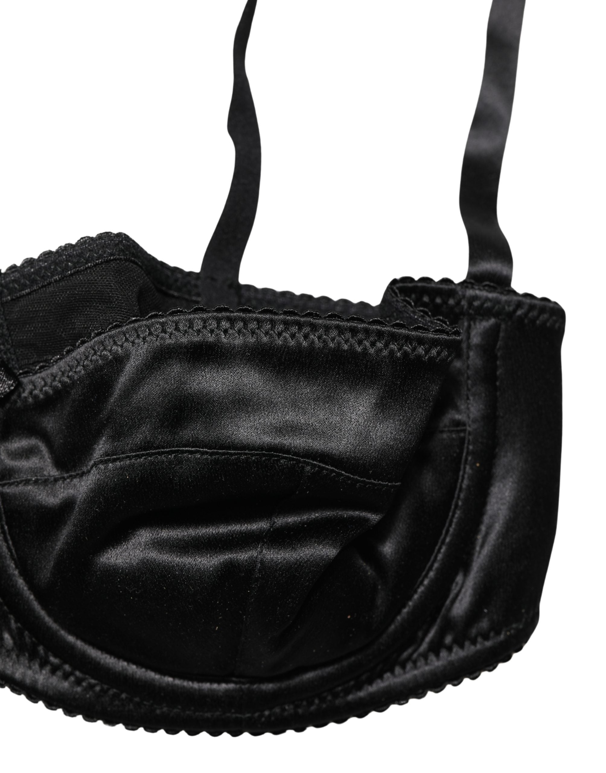 Soutien-gorge balconnet noir Dolce & Gabbana avec armatures mi-pad, design élégant et détails raffinés.