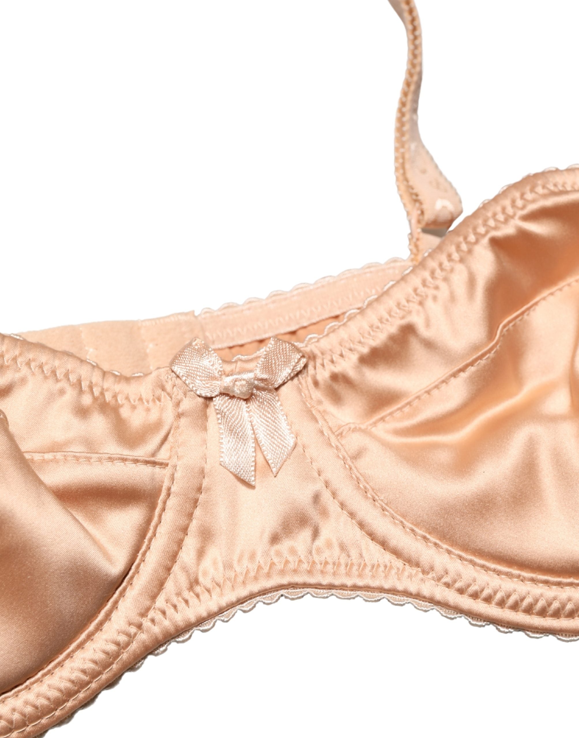 Soutien-gorge balconnet beige Dolce & Gabbana avec armatures semi-rembourrées, style élégant et confort sophistiqué.