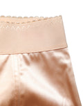 Culotte haute en soie mélangée beige de Dolce & Gabbana, sous-vêtements féminins élégants et confortables.