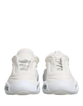 Chaussures Dolce & Gabbana Slip On Wave blanches, baskets basses élégantes avec design moderne et détails en relief.