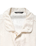 Chemise Dolce & Gabbana en soie blanche à manches longues avec logo ton sur ton, élégante et sophistiquée.