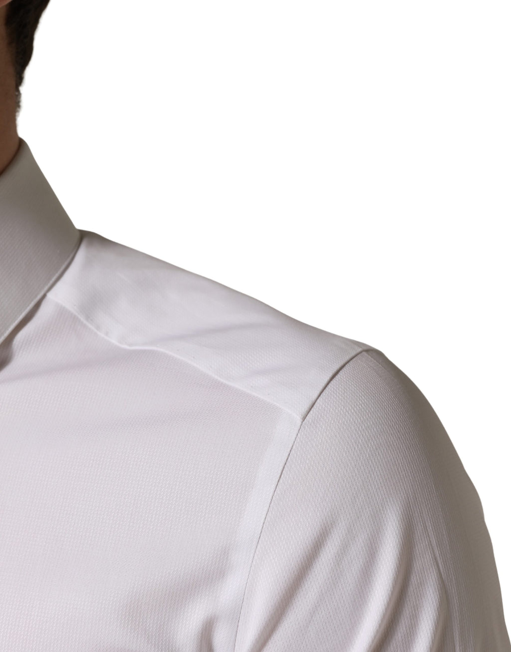 Chemise blanche à manches courtes en coton Dolce & Gabbana avec boutons, vue de face sur fond neutre.