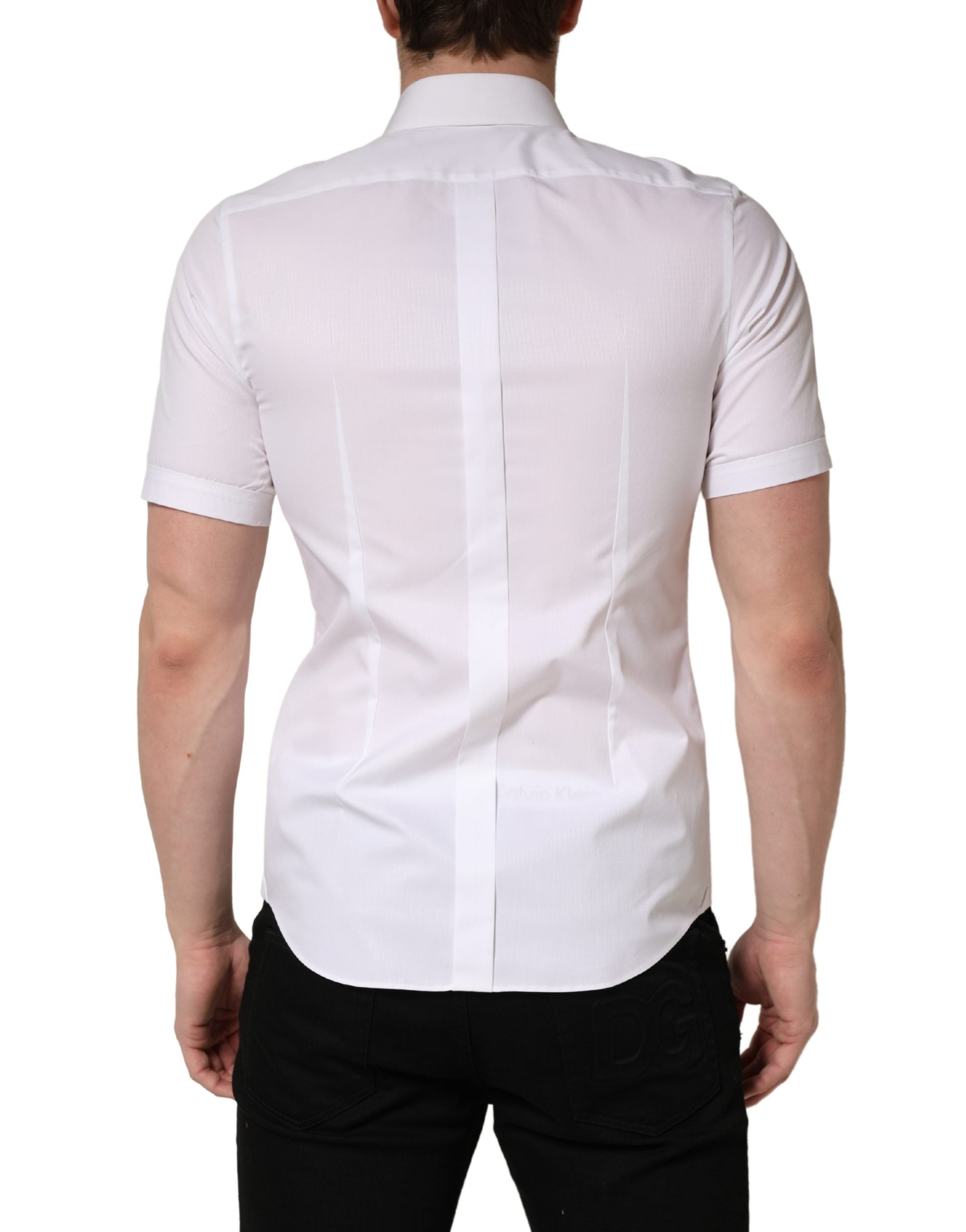 Chemise blanche en coton à manches courtes Dolce & Gabbana avec boutons, vue de face sur un mannequin.